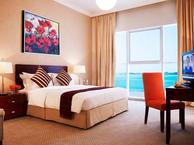 Somerset West Bay Ad Dawhah Esterno foto A bedroom in a hotel